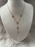 Collier Calista orange fluo doré en acier inoxydable